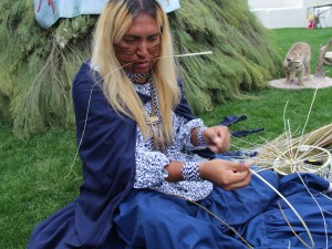 Timothy Ward. Jr, 30, weaves a traditional Apache burden basket at Arizona Indian Festival at Scottsdale Civic Park in January. (Photo by Carina Dominguez/News21)